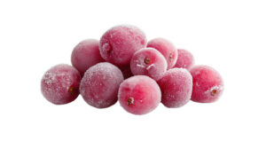 A pile of bright red Frozen Whole Cranberries with round shape and frosted IQF surface on a white background.