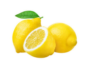 Fresh Lemons, one cut in half to show interior pulp