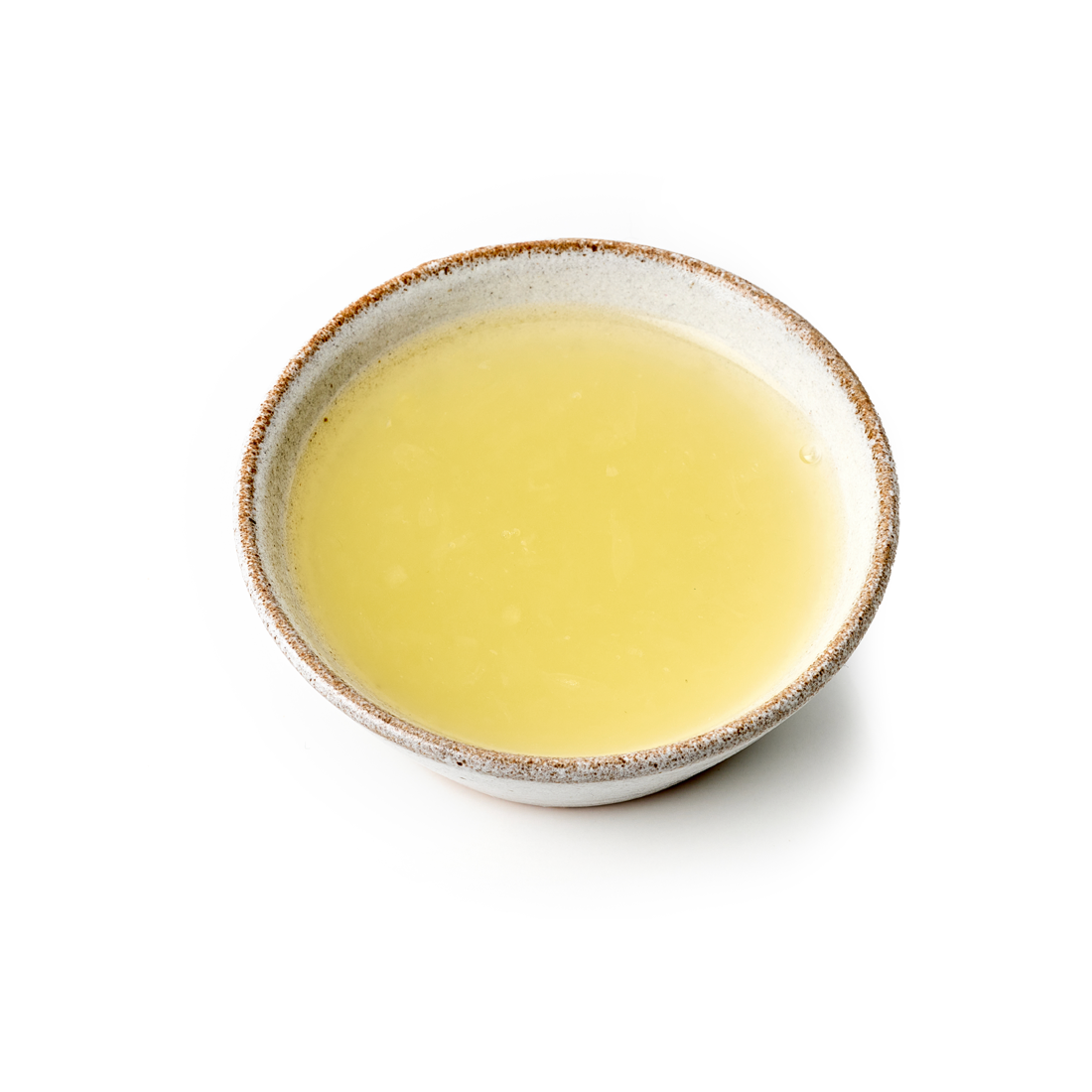 pasteurized Frozen Egg Whites with smooth pale liquid surface on a white background.