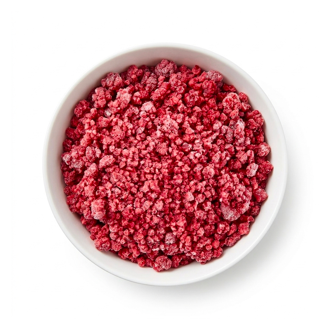 A pile of dark red Frozen Raspberry Crumbles with broken pieces and frosted IQF surface on a white background.